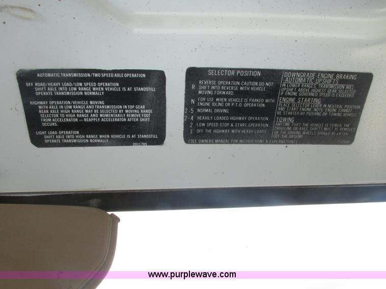 image for item H1200 GMC Sierra applicator truck