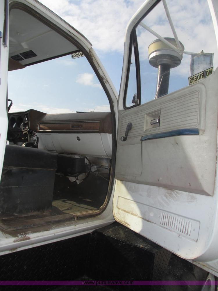 image for item H1200 GMC Sierra applicator truck