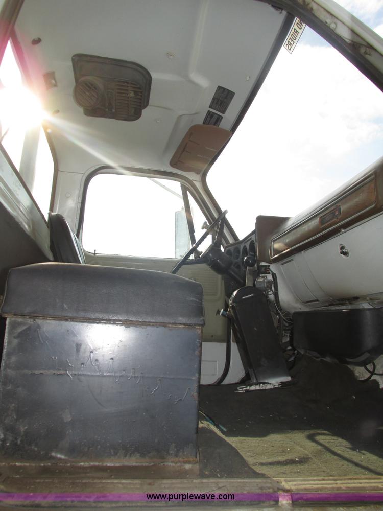 image for item H1200 GMC Sierra applicator truck