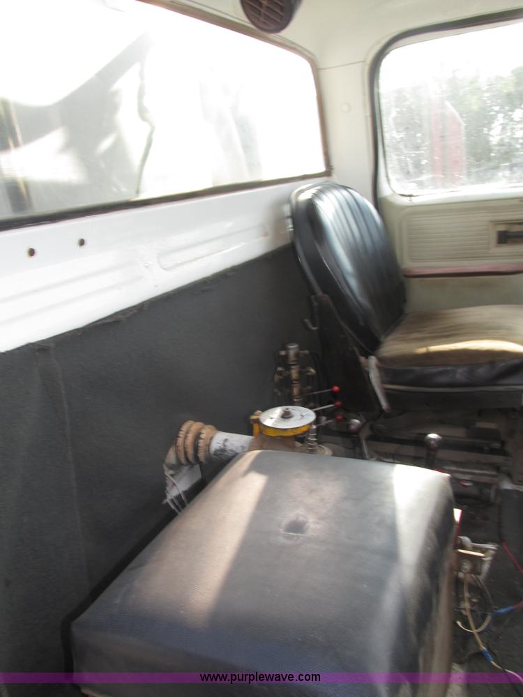 image for item H1200 GMC Sierra applicator truck