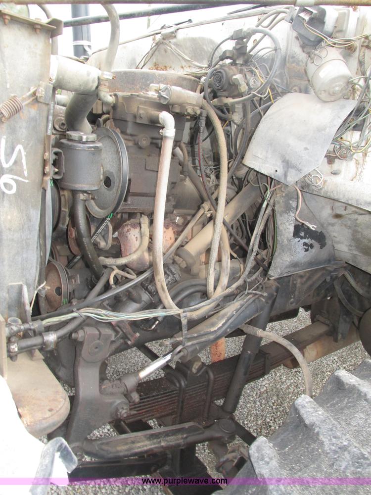 image for item H1200 GMC Sierra applicator truck