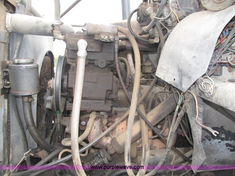 image for item H1200 GMC Sierra applicator truck