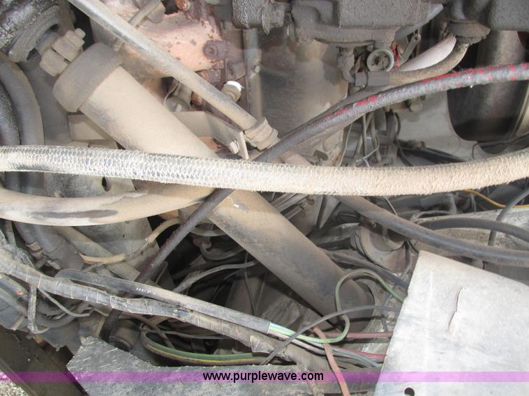 image for item H1200 GMC Sierra applicator truck