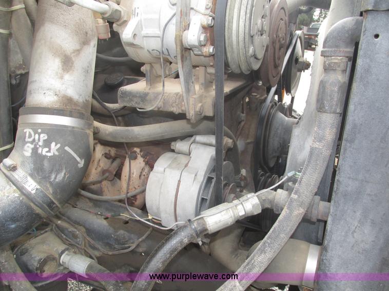 image for item H1200 GMC Sierra applicator truck