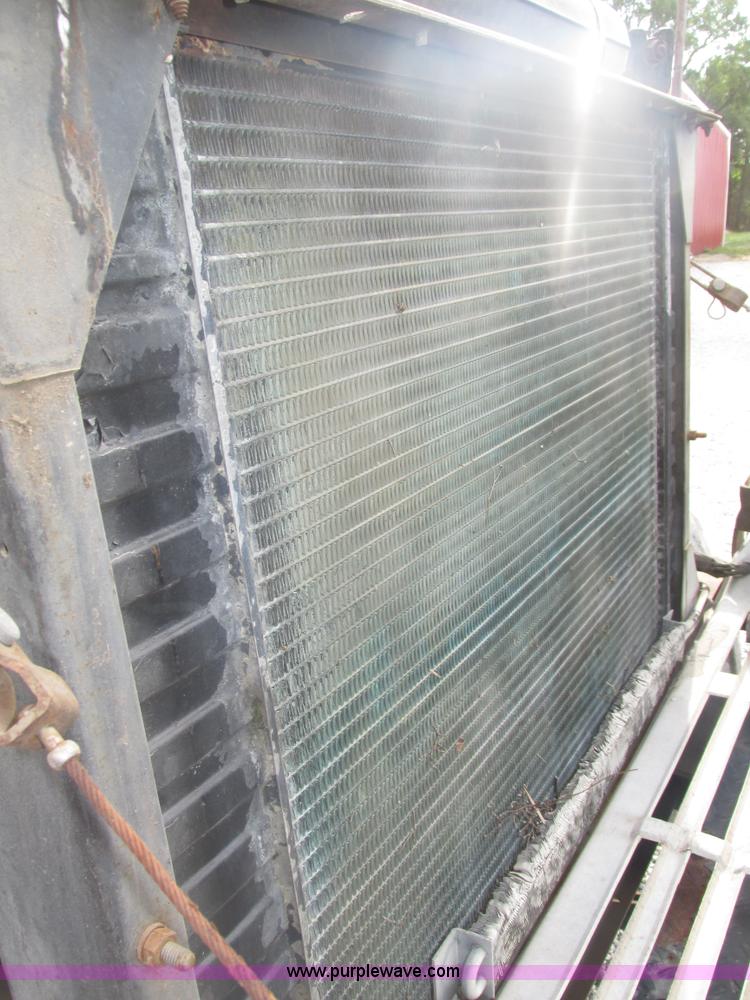 image for item H1200 GMC Sierra applicator truck