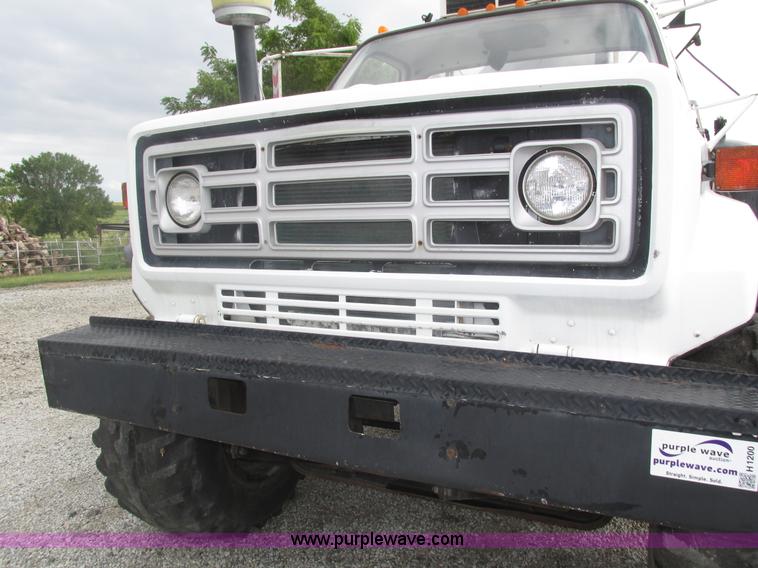 image for item H1200 GMC Sierra applicator truck