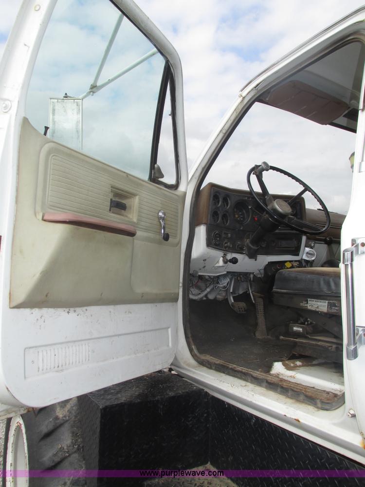 image for item H1200 GMC Sierra applicator truck