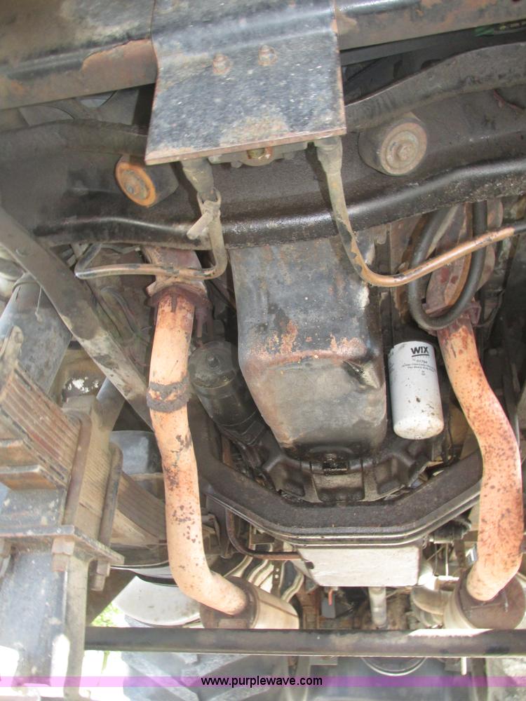 image for item H1200 GMC Sierra applicator truck