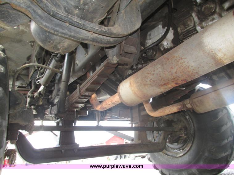 image for item H1200 GMC Sierra applicator truck