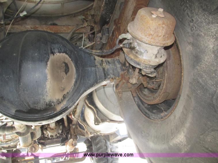 image for item H1200 GMC Sierra applicator truck