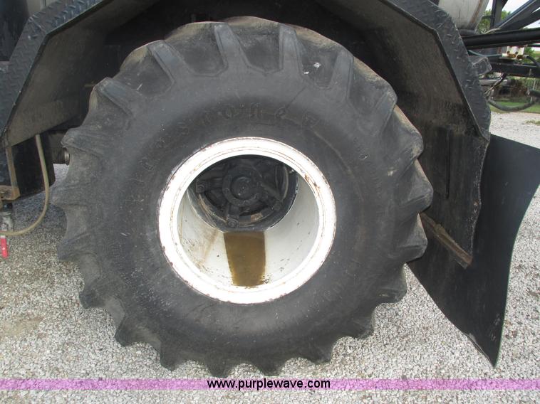 image for item H1200 GMC Sierra applicator truck