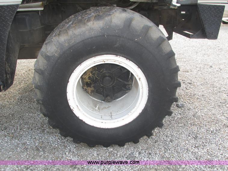 image for item H1200 GMC Sierra applicator truck