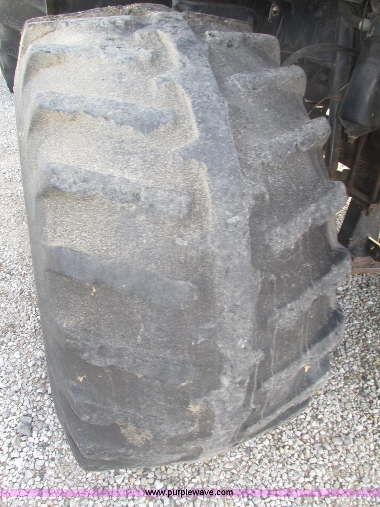 image for item H1200 GMC Sierra applicator truck