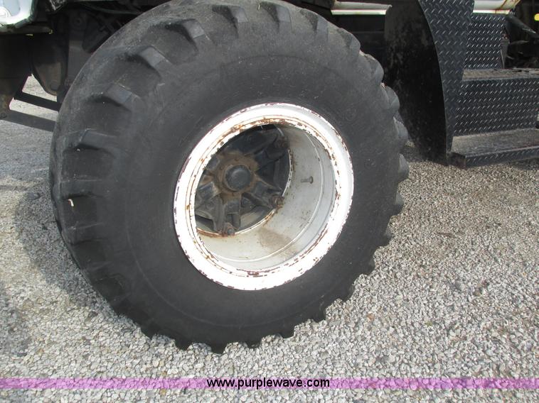 image for item H1200 GMC Sierra applicator truck