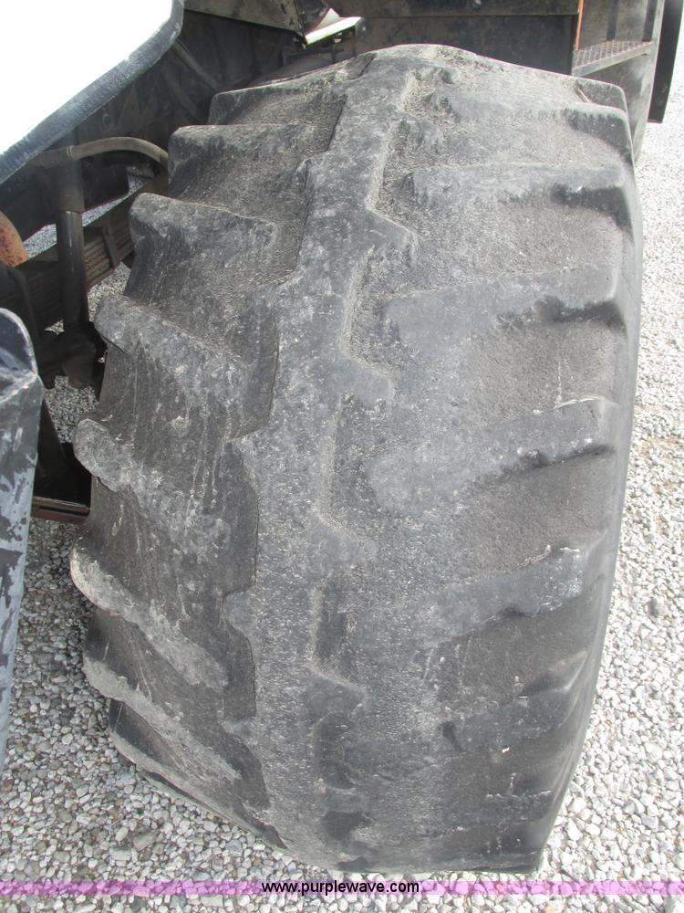 image for item H1200 GMC Sierra applicator truck