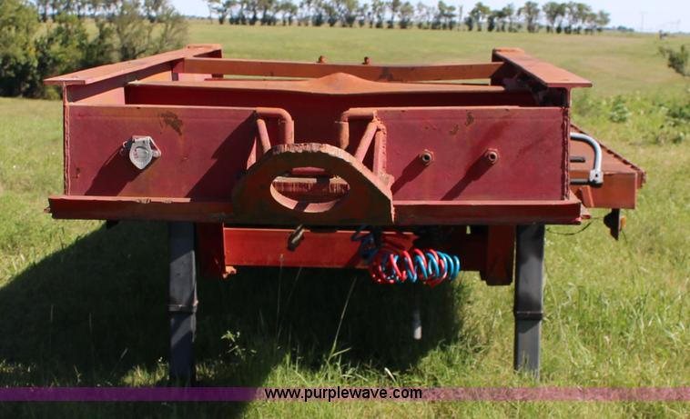 image for item K1103 1976 Triangle A flatbed trailer