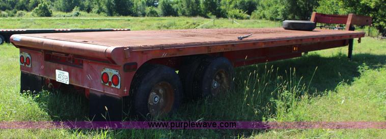 image for item K1103 1976 Triangle A flatbed trailer