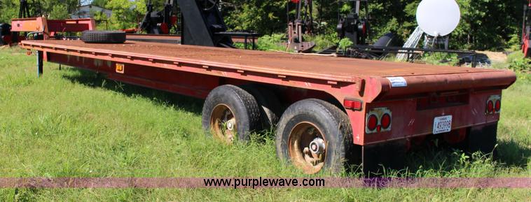image for item K1103 1976 Triangle A flatbed trailer
