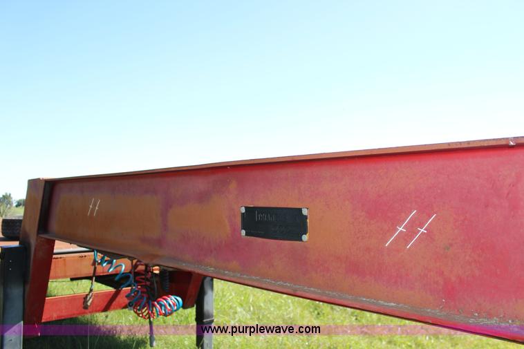 image for item K1103 1976 Triangle A flatbed trailer