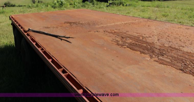 image for item K1103 1976 Triangle A flatbed trailer