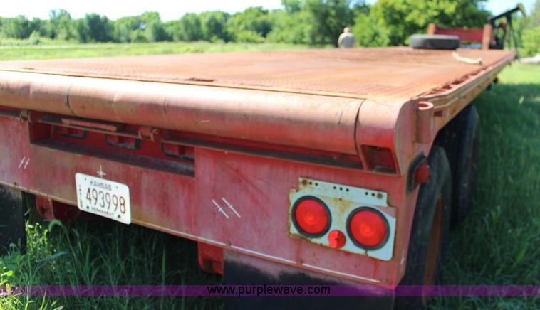 image for item K1103 1976 Triangle A flatbed trailer