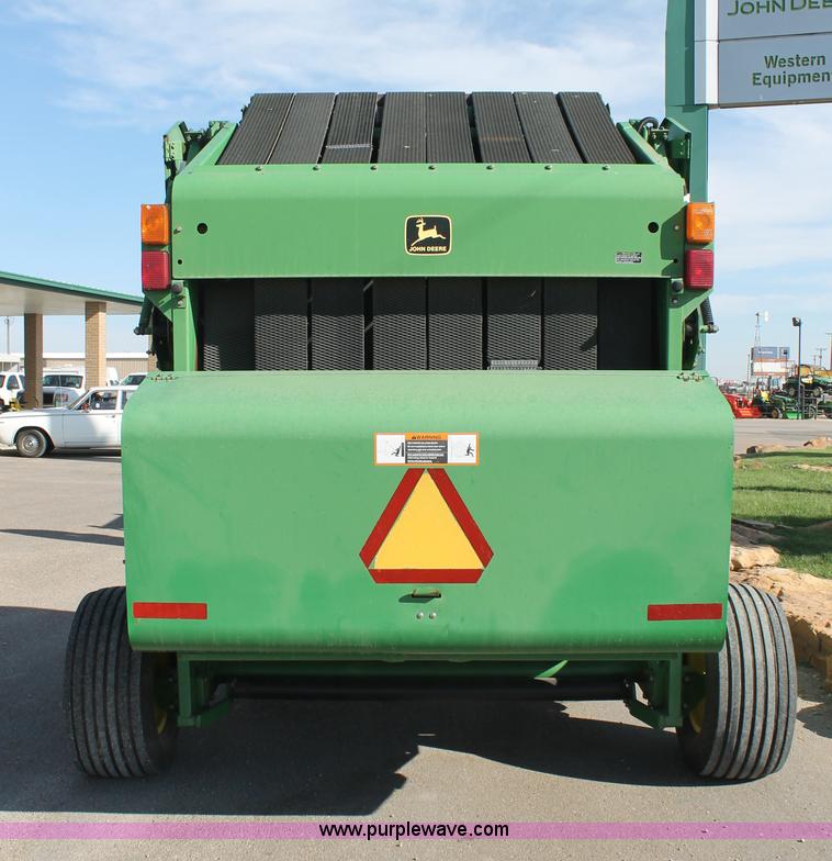 image for item L4426 1999 John Deere 566 round baler