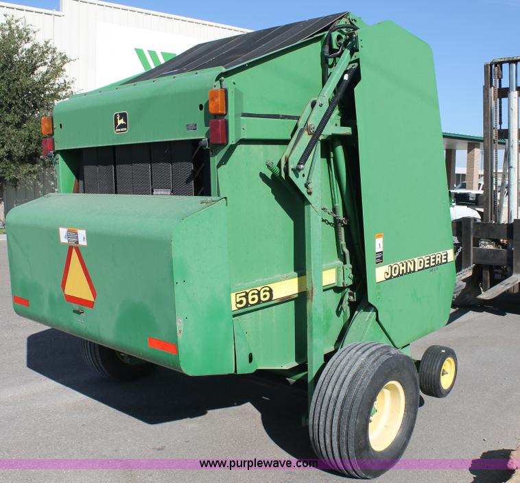 image for item L4426 1999 John Deere 566 round baler