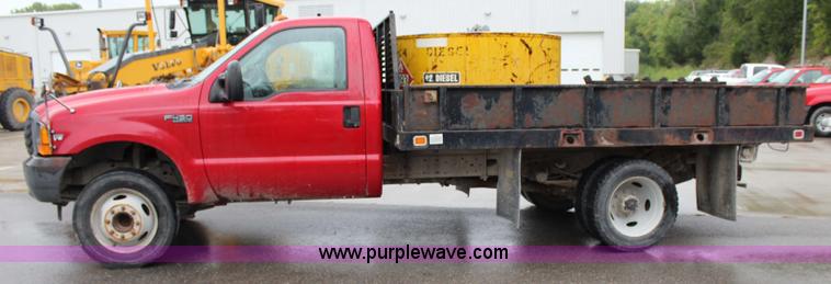 image for item J3506 1999 Ford F450 Super Duty flatbed truck