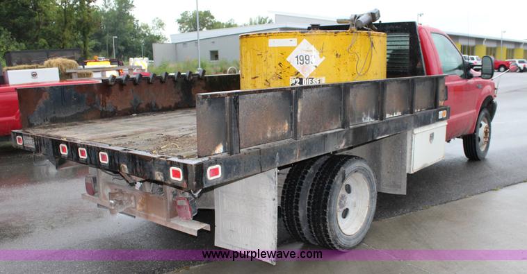 image for item J3506 1999 Ford F450 Super Duty flatbed truck