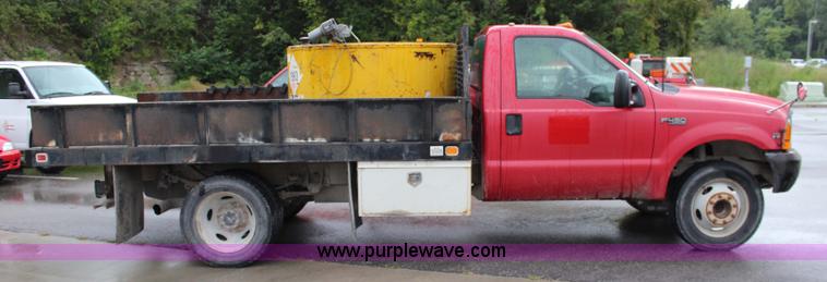 image for item J3506 1999 Ford F450 Super Duty flatbed truck