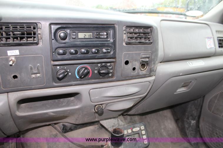 image for item J3506 1999 Ford F450 Super Duty flatbed truck