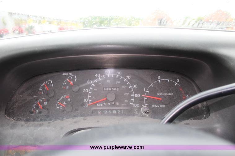 image for item J3506 1999 Ford F450 Super Duty flatbed truck