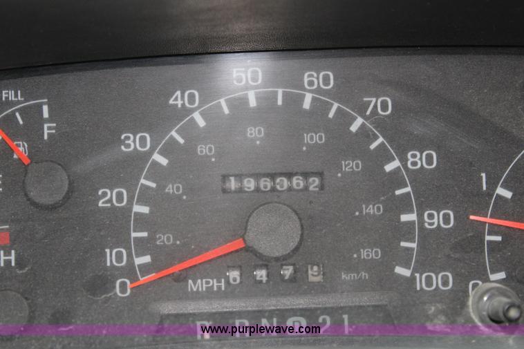 image for item J3506 1999 Ford F450 Super Duty flatbed truck