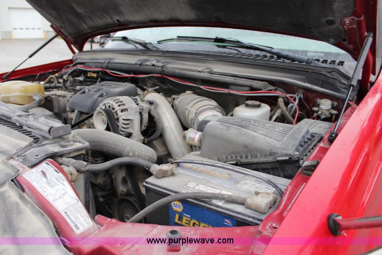 image for item J3506 1999 Ford F450 Super Duty flatbed truck