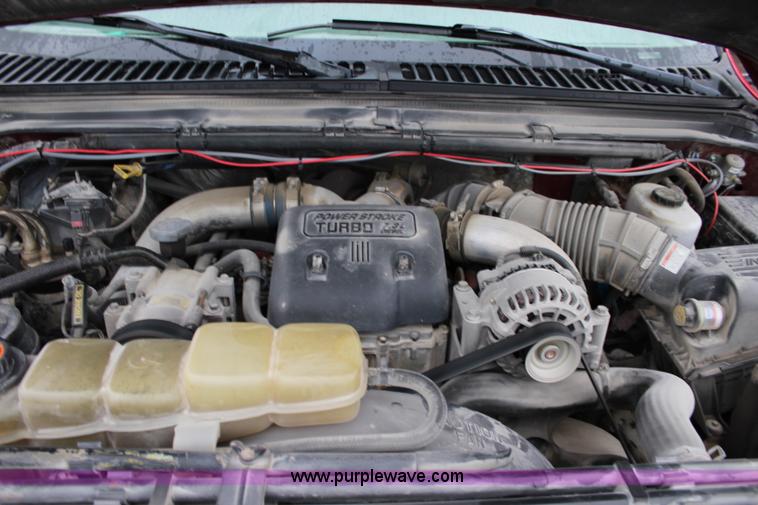 image for item J3506 1999 Ford F450 Super Duty flatbed truck