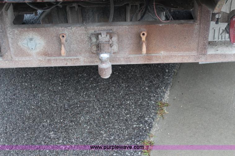 image for item J3506 1999 Ford F450 Super Duty flatbed truck