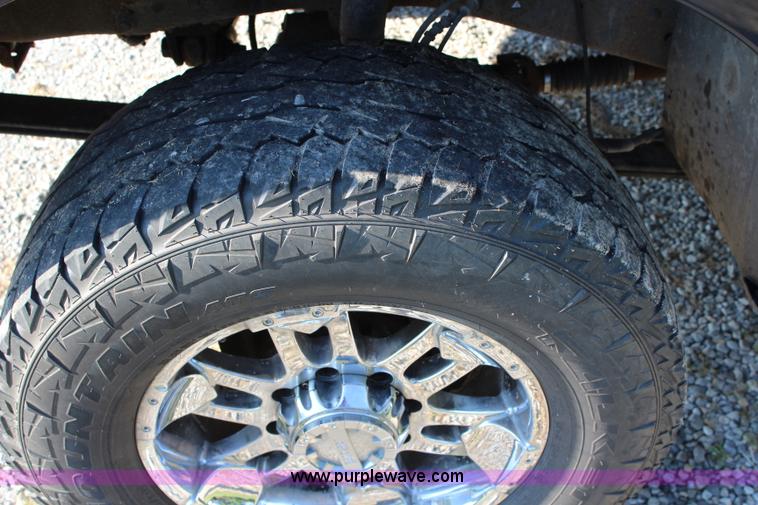 image for item J3551 2003 Ford F250 Super Duty XLT Crew Cab pickup truck