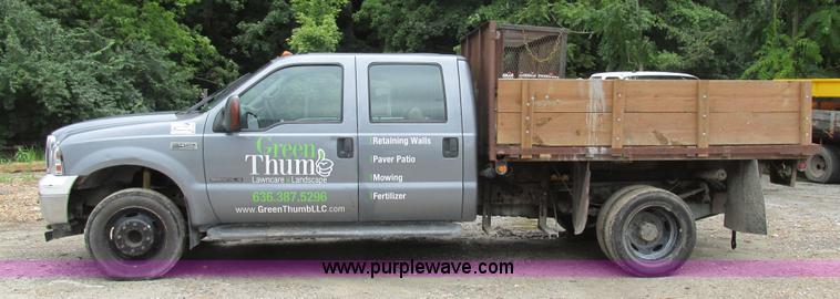 image for item K5102 2002 Ford F450 Super Duty XL Crew Cab dump flat bed truck