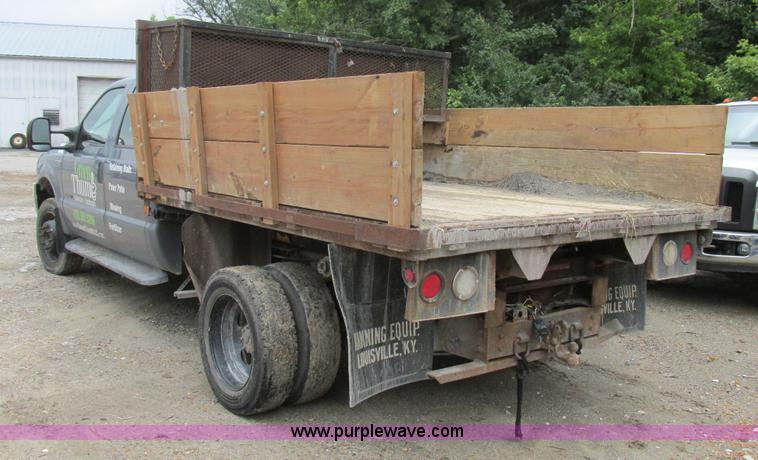 image for item K5102 2002 Ford F450 Super Duty XL Crew Cab dump flat bed truck