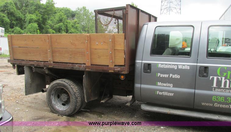 image for item K5102 2002 Ford F450 Super Duty XL Crew Cab dump flat bed truck