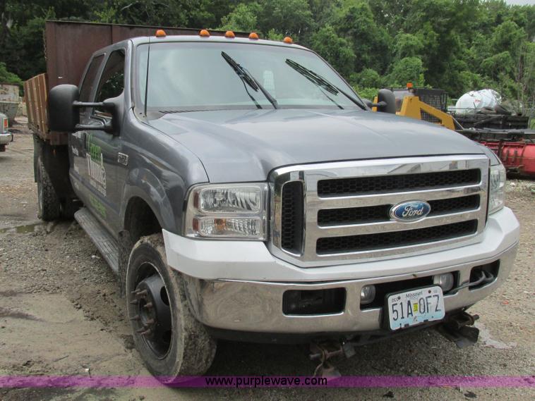 image for item K5102 2002 Ford F450 Super Duty XL Crew Cab dump flat bed truck
