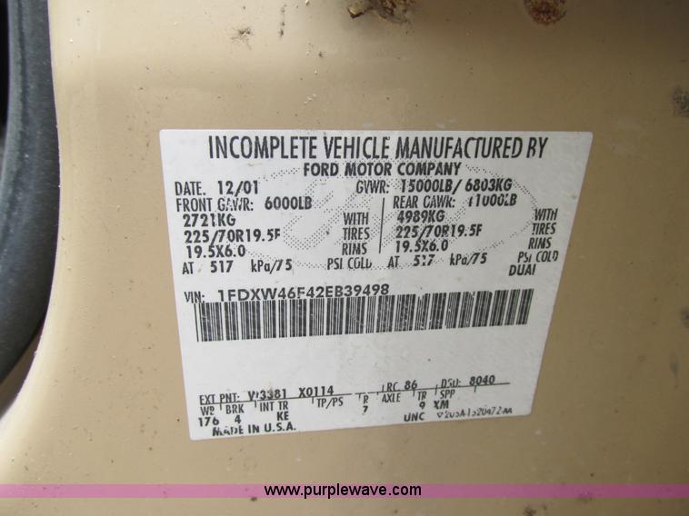 image for item K5102 2002 Ford F450 Super Duty XL Crew Cab dump flat bed truck