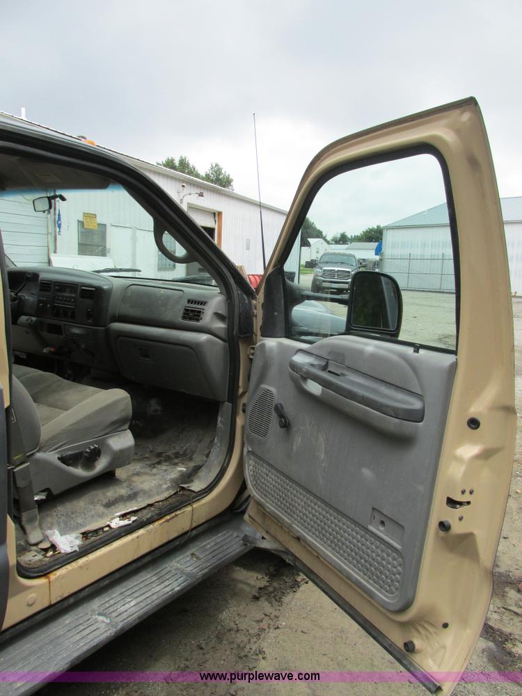 image for item K5102 2002 Ford F450 Super Duty XL Crew Cab dump flat bed truck