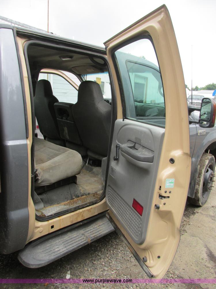 image for item K5102 2002 Ford F450 Super Duty XL Crew Cab dump flat bed truck