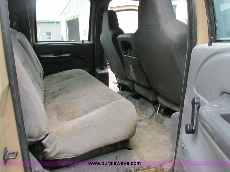 image for item K5102 2002 Ford F450 Super Duty XL Crew Cab dump flat bed truck