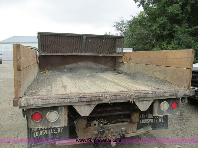 image for item K5102 2002 Ford F450 Super Duty XL Crew Cab dump flat bed truck