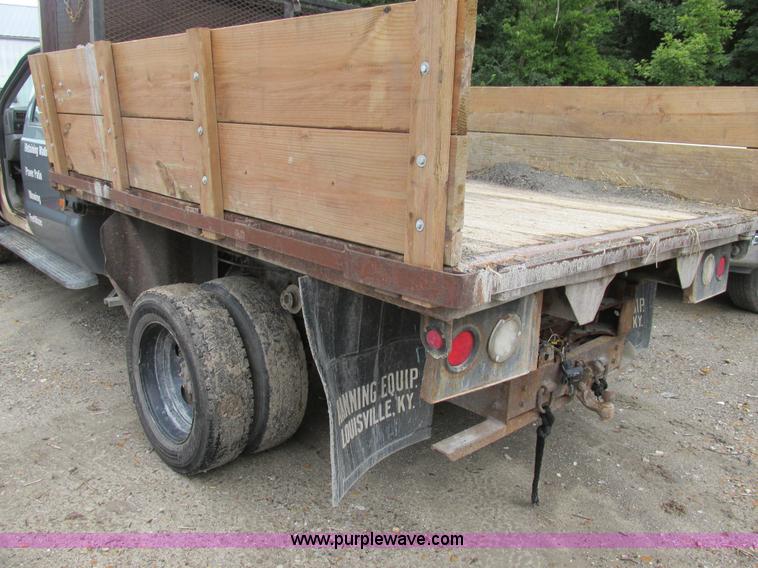 image for item K5102 2002 Ford F450 Super Duty XL Crew Cab dump flat bed truck