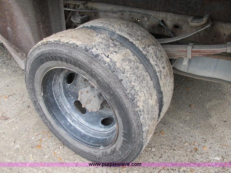 image for item K5102 2002 Ford F450 Super Duty XL Crew Cab dump flat bed truck