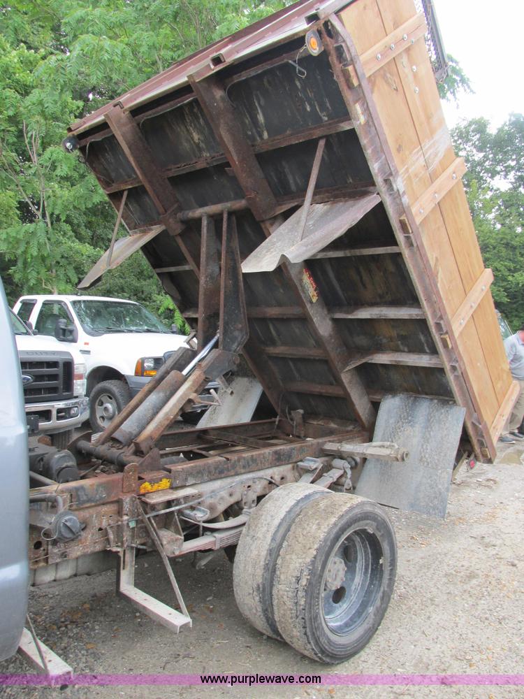 image for item K5102 2002 Ford F450 Super Duty XL Crew Cab dump flat bed truck