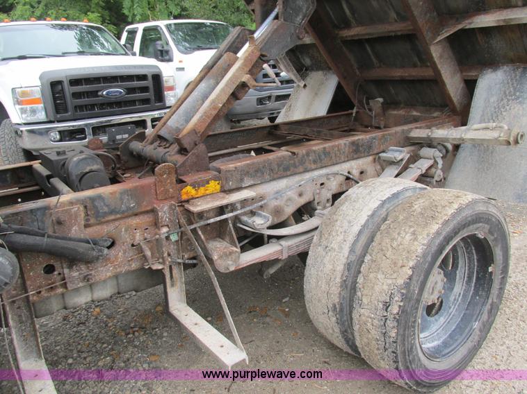 image for item K5102 2002 Ford F450 Super Duty XL Crew Cab dump flat bed truck